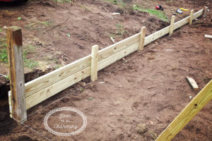Playset Makeover Part 2: Building a retaining wall