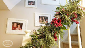 Add the perfect touch to your stairway by displaying pictures of Christmas morning.
